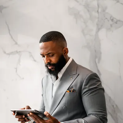 Charles Okpala, editorial, grey suit
